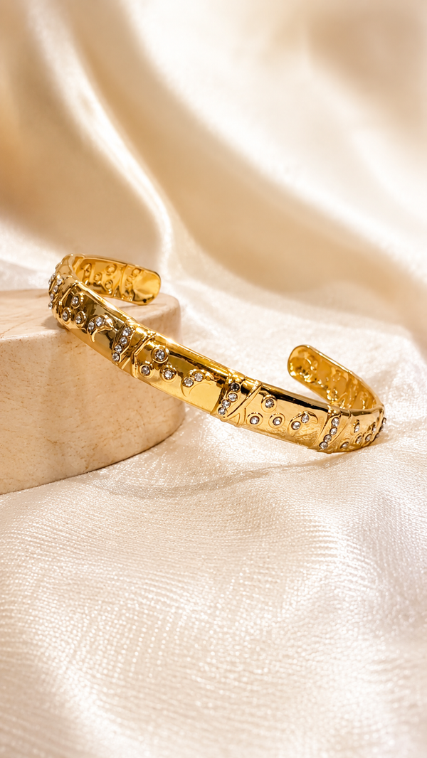 Luxury gold crystal cuff bracelet for women with anti-tarnish finish and adjustable open bangle design by Jewel Minimals.