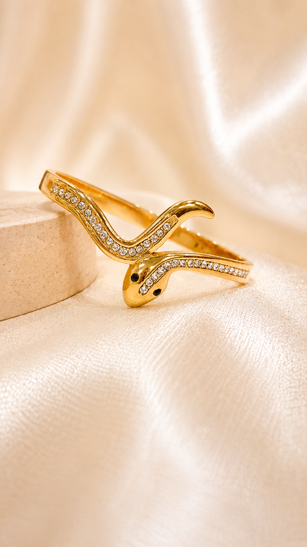 Luxury gold snake crystal cuff bracelet for women with anti-tarnish finish and adjustable open design by Jewel Minimals.
