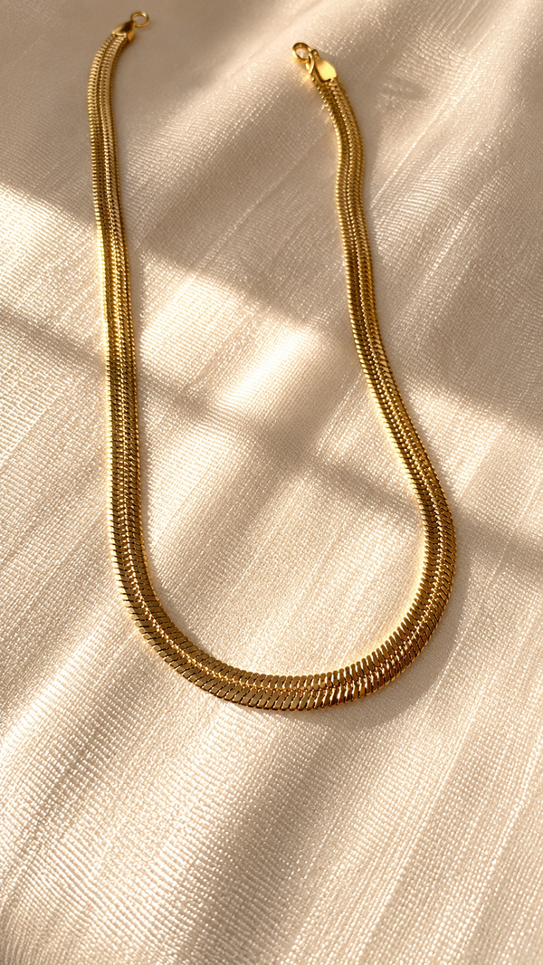 Minimalist gold snake chain necklace with a premium anti-tarnish finish by Jewel Minimals.