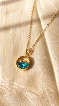 Gold whale ocean pendant necklace with blue crystal wave on a minimalist gold chain, anti-tarnish jewelry by Jewel Minimals.